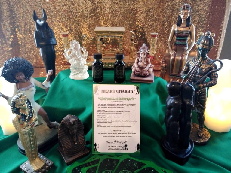 A table with many different statues on it
