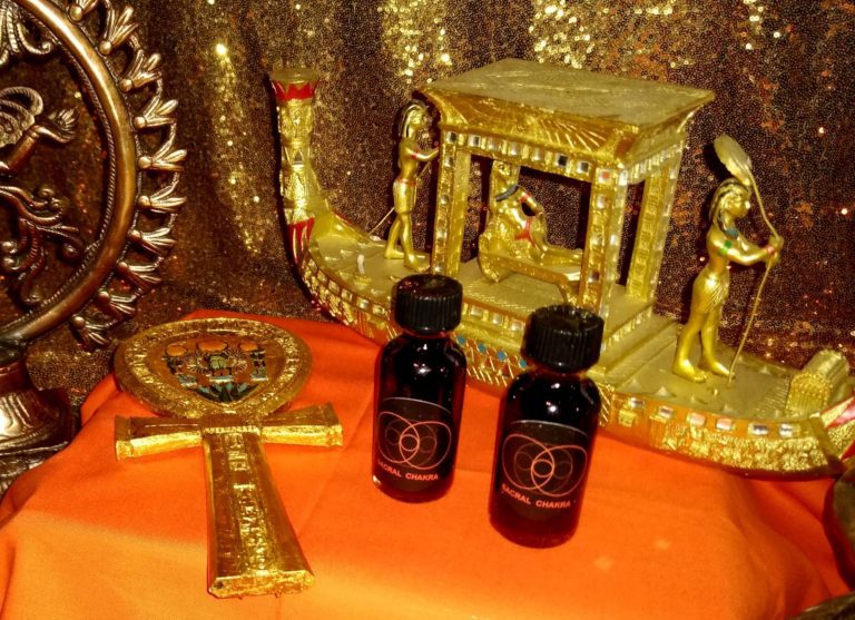 A table with two bottles of oil and an altar.